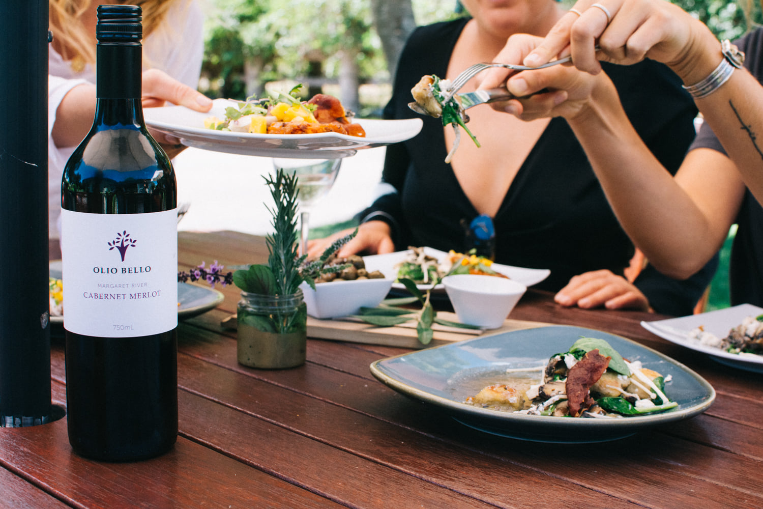 Guests dining alfresco at Olio Bello Cafe, Margaret River.